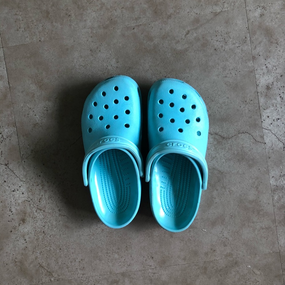 Ice blue crocs (size 9 women’s 7 men’s)
